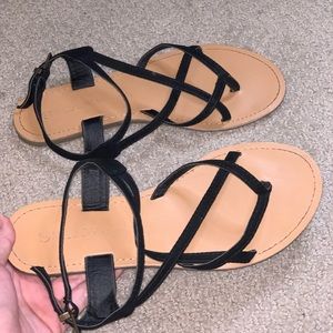 Flat laced sandals